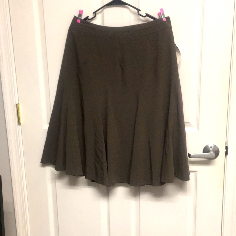 Beautiful drab green skirt.